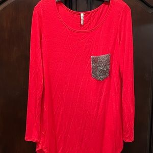 Red shirt with sequined pocket